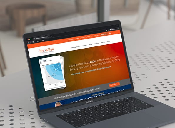 KnowBe4 website on a laptop screen