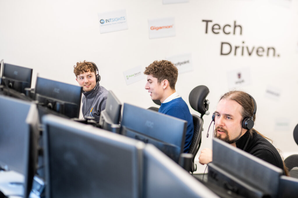 Two members of staff undertaking apprenticeships