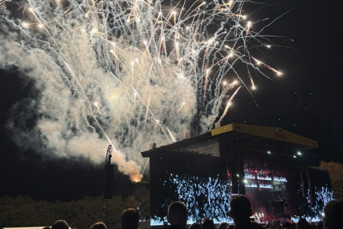 picture of fireworks behind a stage